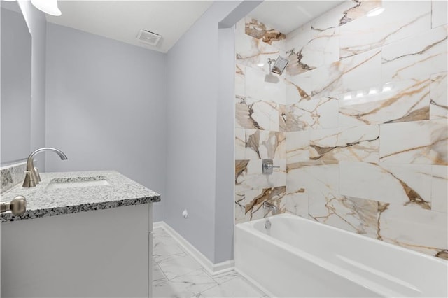 1709 Marty Ave, Kansas City, KS 66103 - bathroom with marble finish flooring, bathing tub / shower combination, and vanity