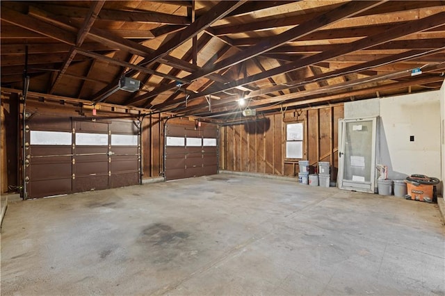 1709 Marty Ave, Kansas City, KS 66103 - garage with a garage door opener