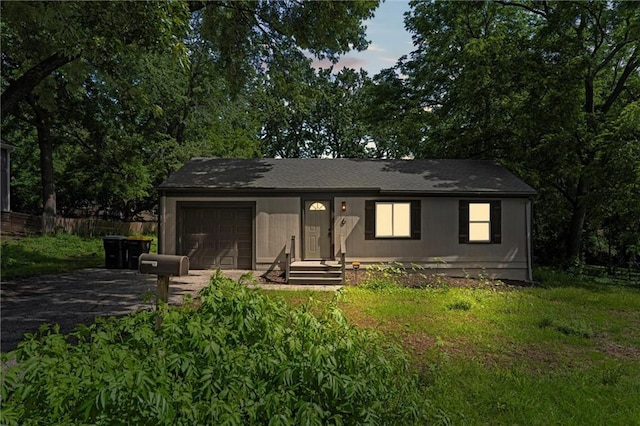 6 W 98th Ter, Kansas City, MO 64114 - ranch-style house with a garage and driveway