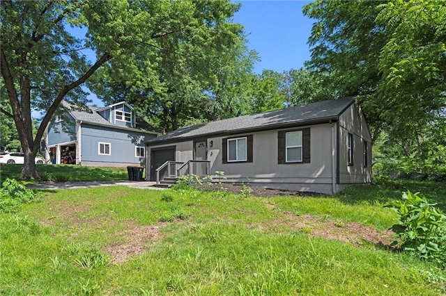 6 W 98th Ter, Kansas City, MO 64114 - view of front facade featuring an attached garage