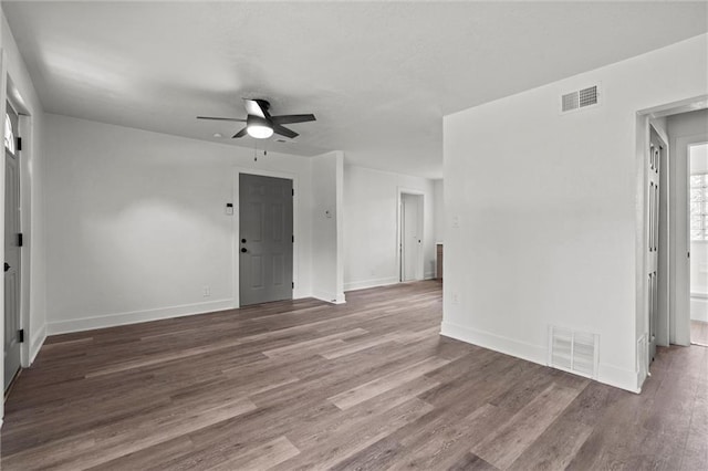6 W 98th Ter, Kansas City, MO 64114 - empty room with a ceiling fan, wood finished floors, and baseboards