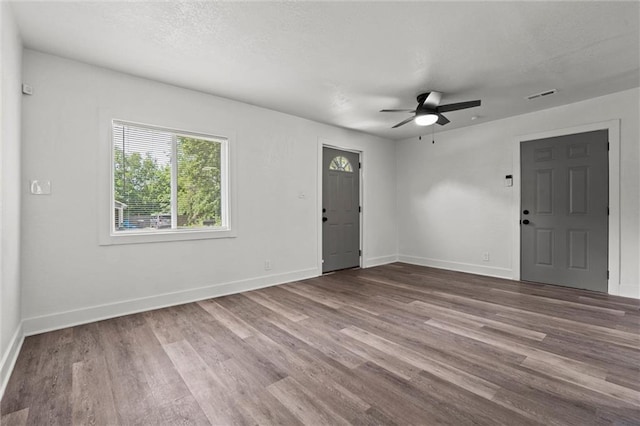 6 W 98th Ter, Kansas City, MO 64114 - entrance foyer with a ceiling fan, wood finished floors, and baseboards