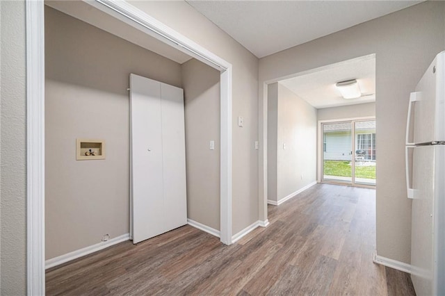 214 NW Parker Dr, Grain Valley, MO 64029 - corridor featuring wood finished floors and baseboards