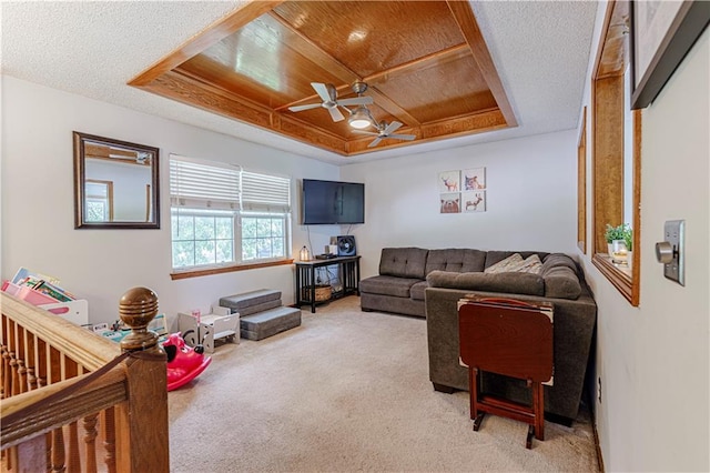 516 S St, Grain Valley, MO 64029 - living room with light colored carpet, ceiling fan, a textured ceiling, and wooden ceiling