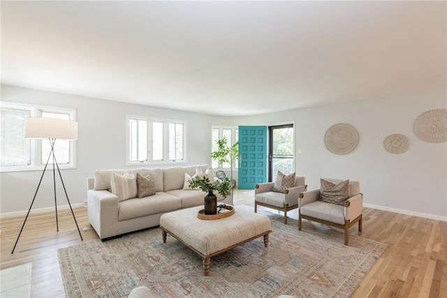 5308 Foster St, Overland Park, KS 66202 - living area featuring light wood-style flooring and baseboards