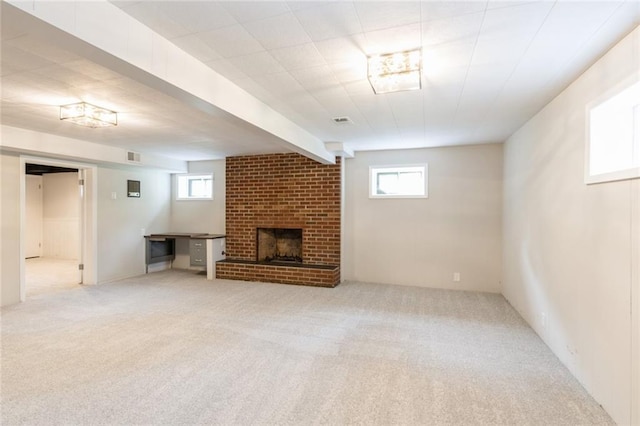 5308 Foster St, Overland Park, KS 66202 - unfurnished living room featuring carpet, a fireplace, and plenty of natural light