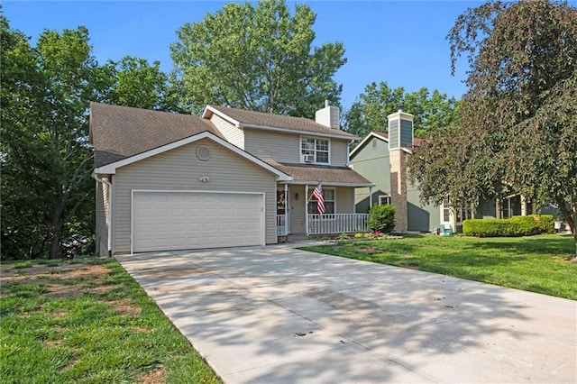 446 Hithergreen Dr, Lansing, KS 66043 - traditional-style home featuring covered porch, an attached garage, driveway, a front lawn, and a chimney