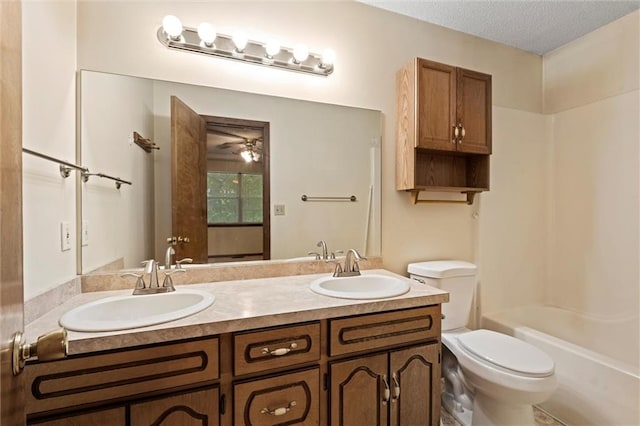 446 Hithergreen Dr, Lansing, KS 66043 - full bath featuring double vanity, bathtub / shower combination, a ceiling fan, and a textured ceiling