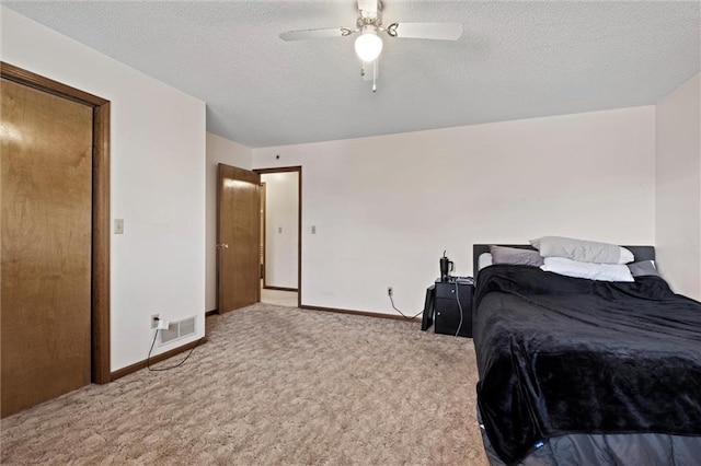 446 Hithergreen Dr, Lansing, KS 66043 - carpeted bedroom with a textured ceiling and ceiling fan
