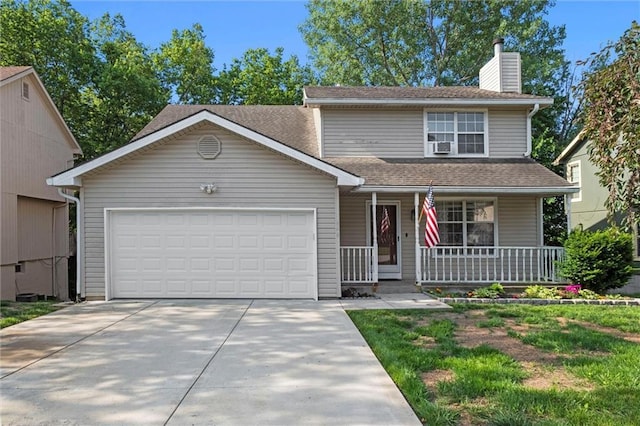 446 Hithergreen Dr, Lansing, KS 66043 - view of front of home featuring a porch, an attached garage, a chimney, concrete driveway, and roof with shingles