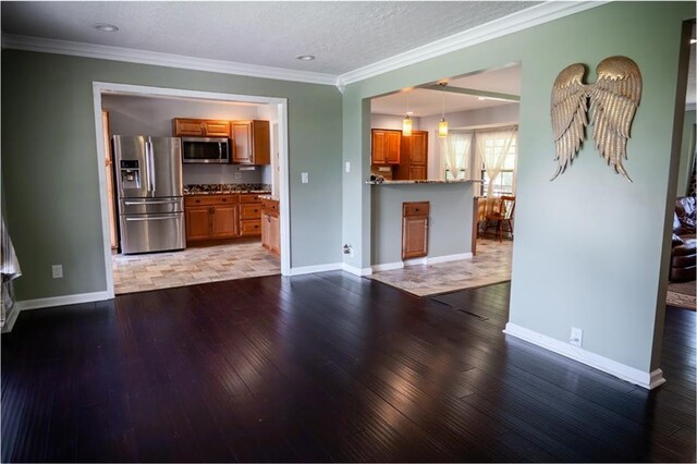 1504 SW 9th St, Lees Summit, MO 64081 - unfurnished living room with dark wood-style floors, crown molding, and recessed lighting
