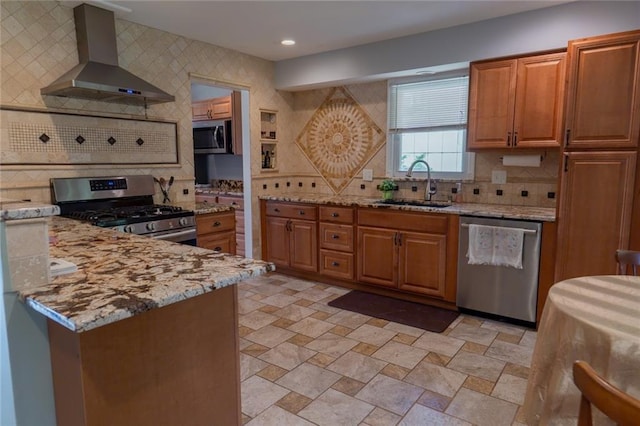 1504 SW 9th St, Lees Summit, MO 64081 - kitchen featuring appliances with stainless steel finishes, wall chimney exhaust hood, backsplash, brown cabinetry, and recessed lighting