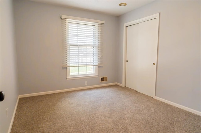 1504 SW 9th St, Lees Summit, MO 64081 - spare room with carpet flooring
