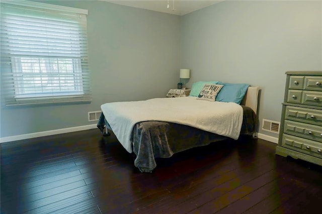 1504 SW 9th St, Lees Summit, MO 64081 - bedroom with baseboards and dark wood-style floors