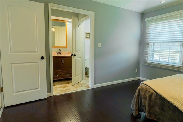 1504 SW 9th St, Lees Summit, MO 64081 - bedroom featuring hardwood / wood-style flooring and ensuite bath