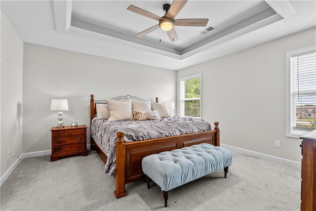 19714 W 197th Ct, Spring Hill, KS 66083 - bedroom featuring a raised ceiling, light carpet, baseboards, and ceiling fan
