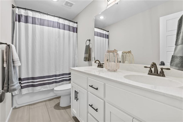 19714 W 197th Ct, Spring Hill, KS 66083 - bathroom with toilet, double vanity, shower / bath combo, recessed lighting, and tile patterned flooring