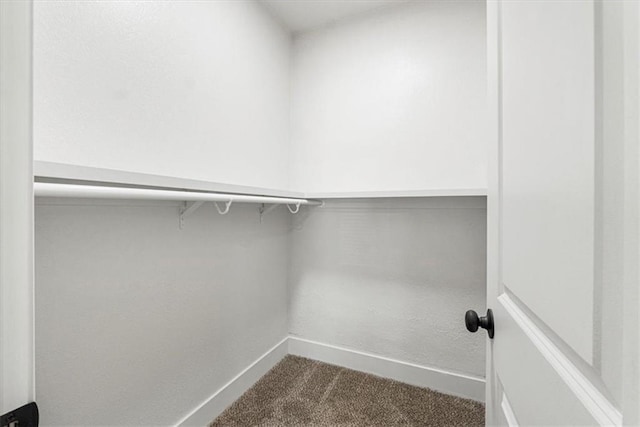 1115 S Leslie St, Independence, MO 64050 - spacious closet featuring dark carpet