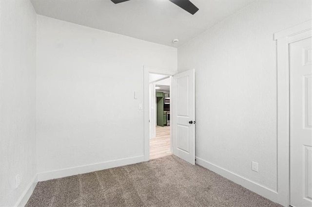 1115 S Leslie St, Independence, MO 64050 - carpeted spare room with ceiling fan and baseboards
