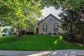 13724 Pembroke Cir, Leawood, KS 66224 - view of front facade with a front yard