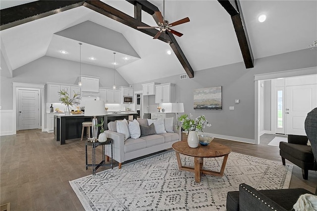 19433 W 114th Ter, Olathe, KS 66061 - living area featuring ceiling fan, wood finished floors, baseboards, high vaulted ceiling, and recessed lighting