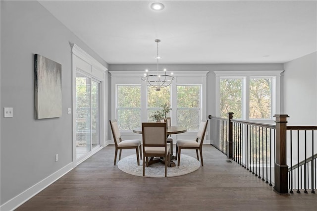 19433 W 114th Ter, Olathe, KS 66061 - dining space featuring a chandelier, healthy amount of natural light, dark wood-style flooring, baseboards, and recessed lighting