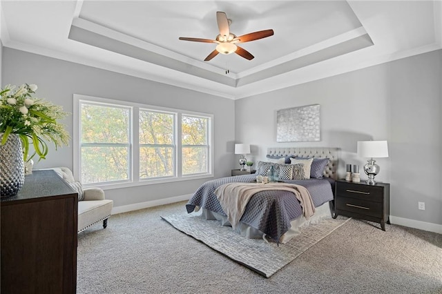 19433 W 114th Ter, Olathe, KS 66061 - bedroom with a tray ceiling, baseboards, carpet floors, and a ceiling fan