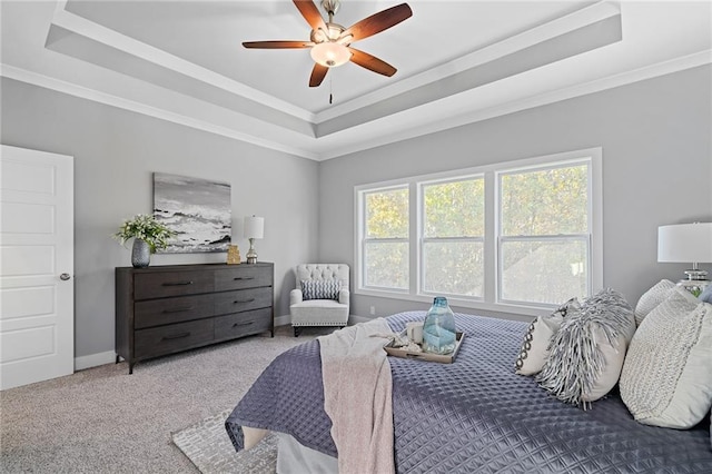 19433 W 114th Ter, Olathe, KS 66061 - bedroom featuring a tray ceiling, carpet floors, baseboards, ornamental molding, and a ceiling fan