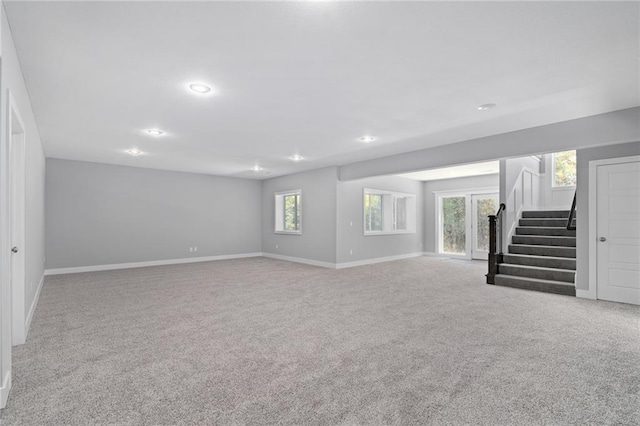 19433 W 114th Ter, Olathe, KS 66061 - basement featuring carpet, stairway, baseboards, and recessed lighting