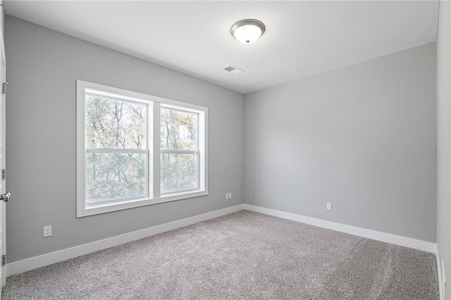 19433 W 114th Ter, Olathe, KS 66061 - carpeted empty room with baseboards