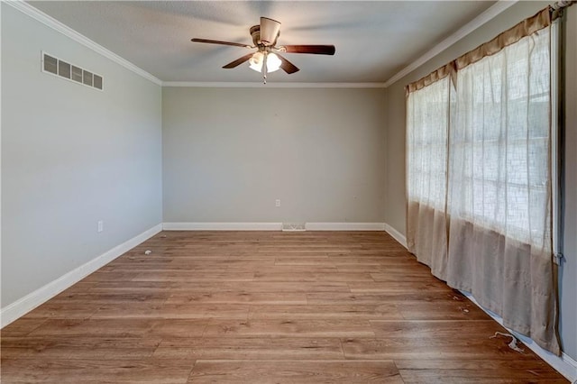 739 SW 700th Rd, Holden, MO 64040 - unfurnished room with ceiling fan, crown molding, light wood finished floors, and baseboards