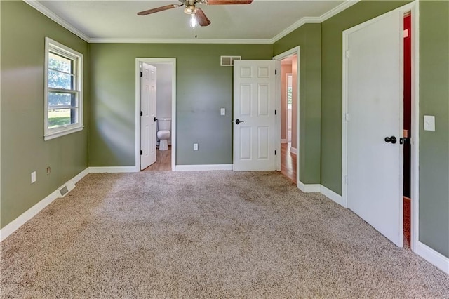 739 SW 700th Rd, Holden, MO 64040 - unfurnished bedroom with carpet flooring, baseboards, crown molding, connected bathroom, and ceiling fan