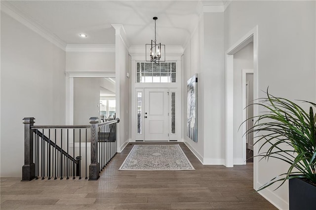 19477 W 114th Ter, Olathe, KS 66061 - foyer with a chandelier, ornamental molding, wood finished floors, and recessed lighting
