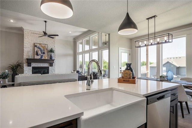 19477 W 114th Ter, Olathe, KS 66061 - kitchen featuring open floor plan, dishwasher, ceiling fan, light countertops, and ornamental molding