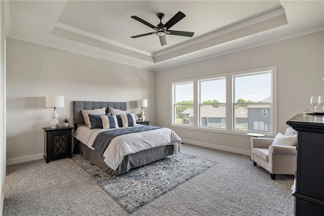 19477 W 114th Ter, Olathe, KS 66061 - bedroom with a tray ceiling, carpet floors, crown molding, and a ceiling fan