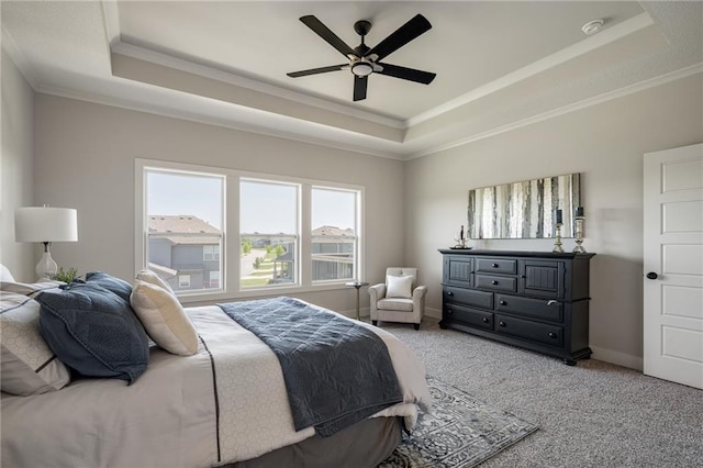 19477 W 114th Ter, Olathe, KS 66061 - bedroom featuring a raised ceiling, light colored carpet, ornamental molding, and ceiling fan