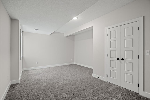 19477 W 114th Ter, Olathe, KS 66061 - finished below grade area with carpet and a textured ceiling