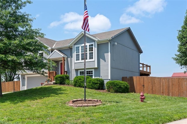601 W 3rd Ter, Wellsville, KS 66092 - view of front of property with a garage