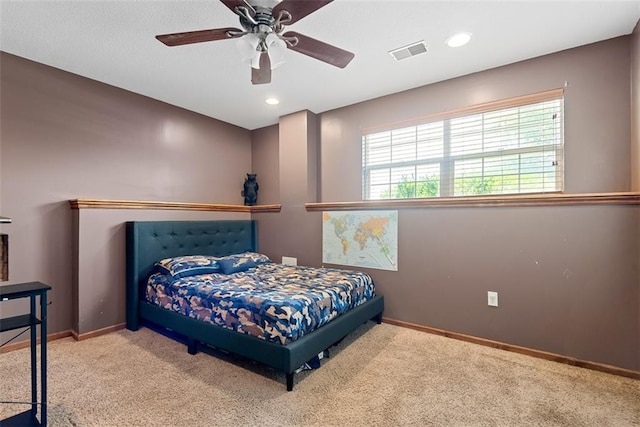 601 W 3rd Ter, Wellsville, KS 66092 - carpeted bedroom with baseboards, a ceiling fan, and recessed lighting