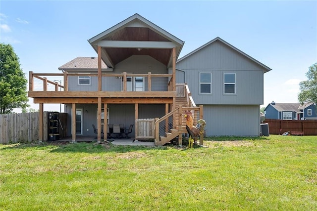 601 W 3rd Ter, Wellsville, KS 66092 - rear view of property featuring stairway, a deck, central air condition unit, and a patio area