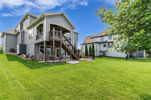 9812 Saddletop St, Lenexa, KS 66227 - rear view of house with a patio, stairway, ceiling fan, and a deck