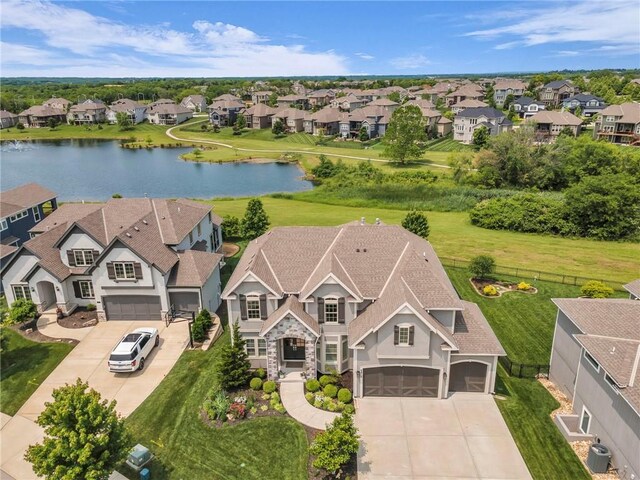9812 Saddletop St, Lenexa, KS 66227 - aerial view of residential area featuring a large body of water