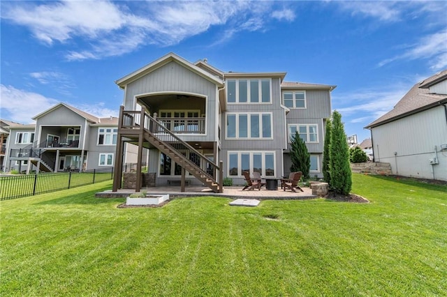 9812 Saddletop St, Lenexa, KS 66227 - rear view of property featuring stairs, a patio, a ceiling fan, and a deck