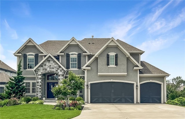 9812 Saddletop St, Lenexa, KS 66227 - french provincial home featuring stucco siding, concrete driveway, a front yard, roof with shingles, and an attached garage