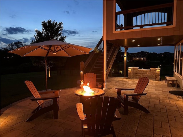 9812 Saddletop St, Lenexa, KS 66227 - view of patio / terrace with an outdoor fire pit and stairway