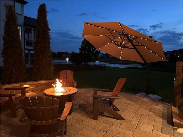 9812 Saddletop St, Lenexa, KS 66227 - view of patio with a fire pit