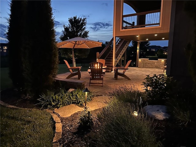 9812 Saddletop St, Lenexa, KS 66227 - view of patio with stairway and a fire pit