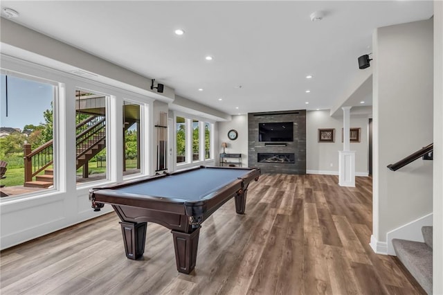 9812 Saddletop St, Lenexa, KS 66227 - game room with wood finished floors, recessed lighting, pool table, and a fireplace
