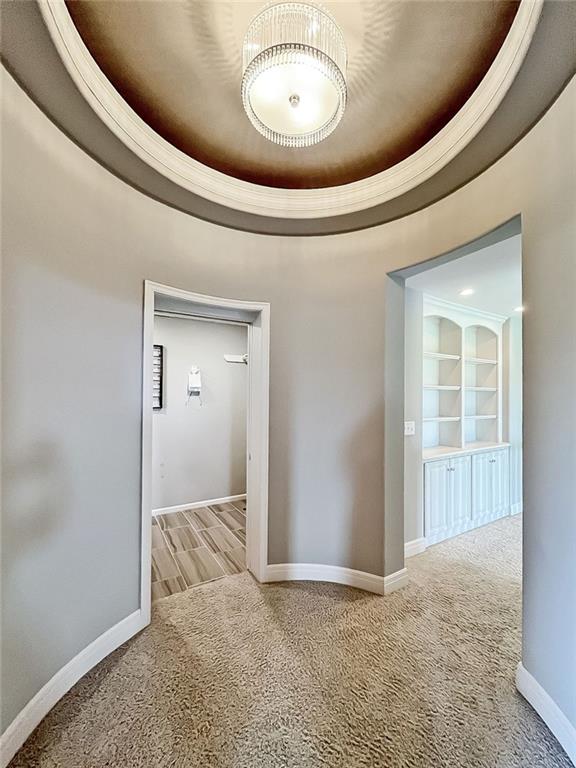 9812 Saddletop St, Lenexa, KS 66227 - corridor with carpet flooring and baseboards