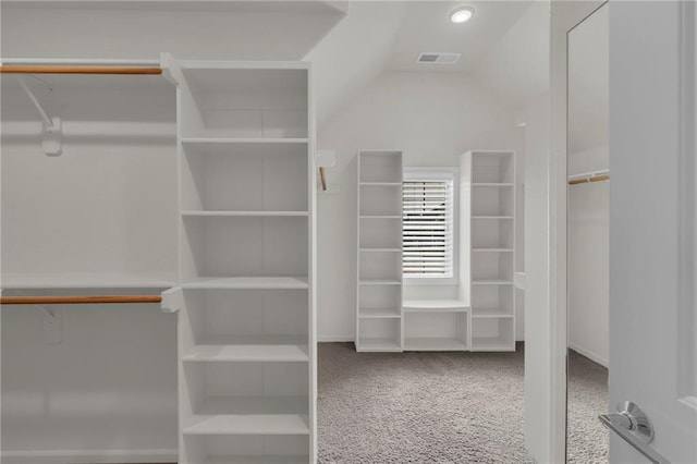 9812 Saddletop St, Lenexa, KS 66227 - spacious closet with carpet flooring and lofted ceiling